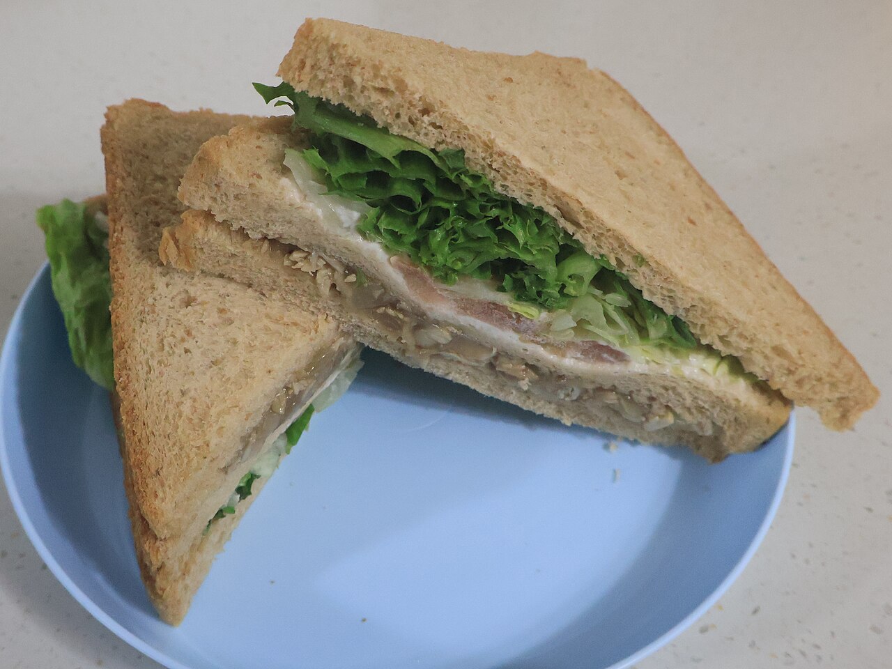 Chilled sandwich and prepared food shelves in a Korean convenience store