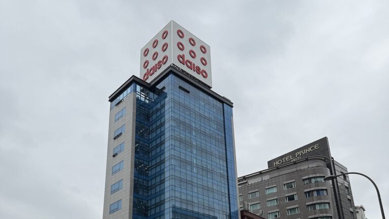 Daiso Korea Myeongdong Station store building with the red Daiso cube sign