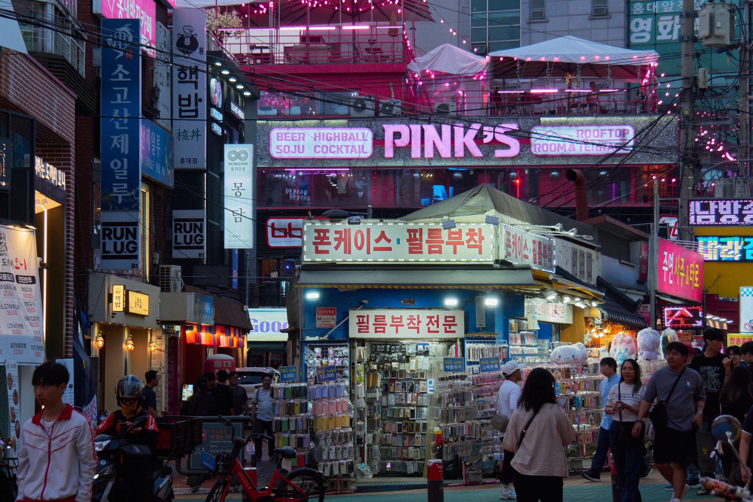 Hongdae street in Seoul at dusk, a neighbourhood with many personal color studios