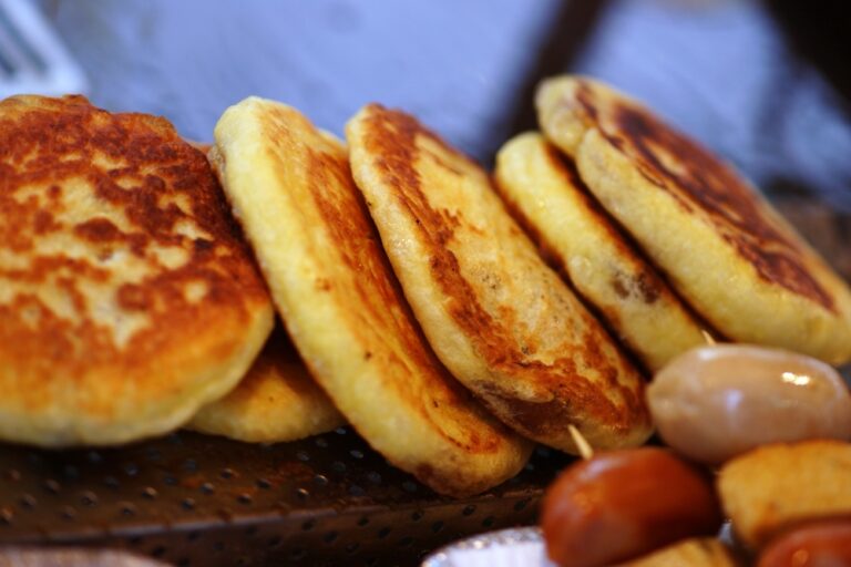 Freshly pan-fried hotteok seoul street stall pancakes on a griddle
