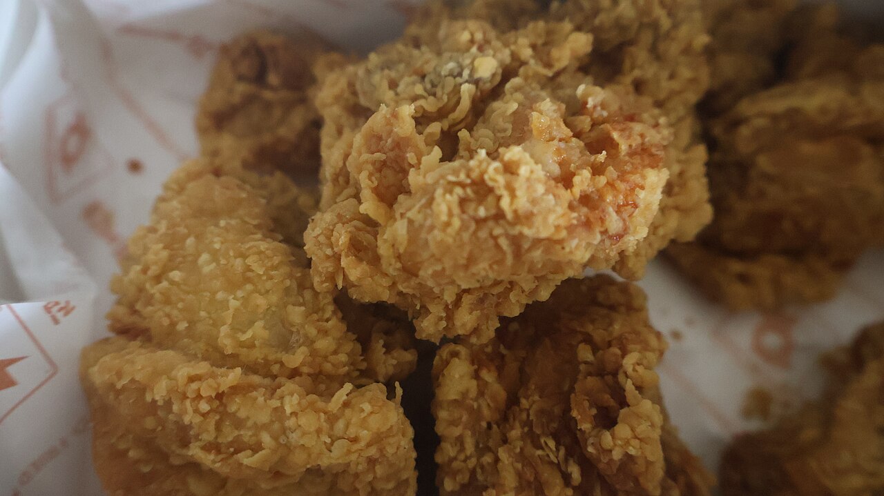 Plain huraideu fried chicken with a crisp golden coating served in Korea