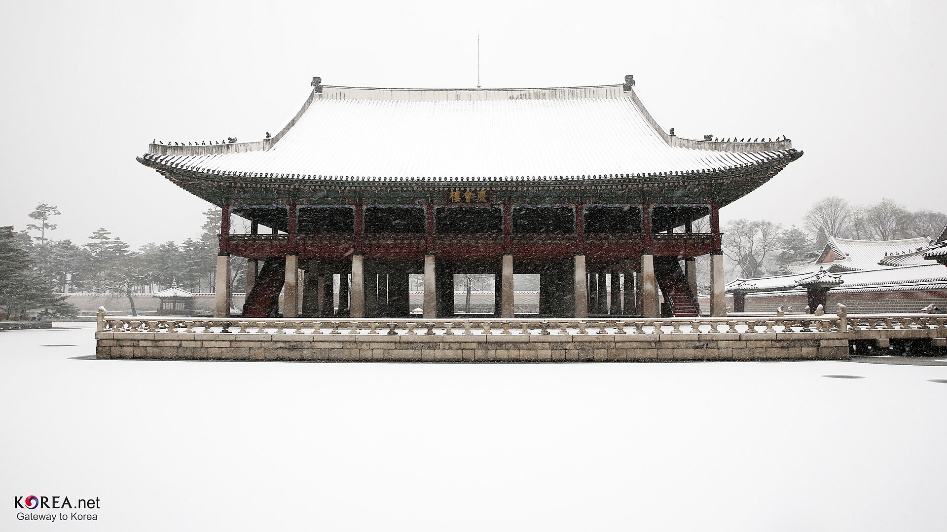 Snow covering a Seoul street and rooftops in January, Korea in January winter scene