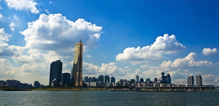 Seoul skyline along the Han River with apartment towers in daylight