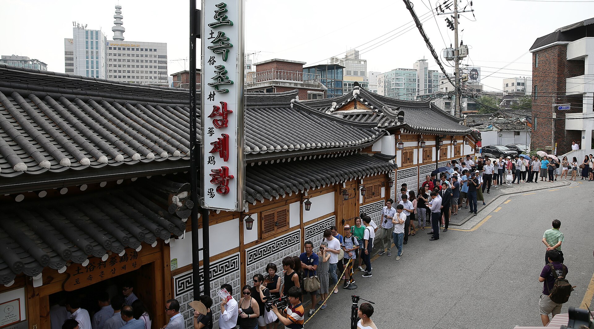 Queue outside Tosokchon Samgyetang in Seoul on Malbok, the last of the summer boknal days