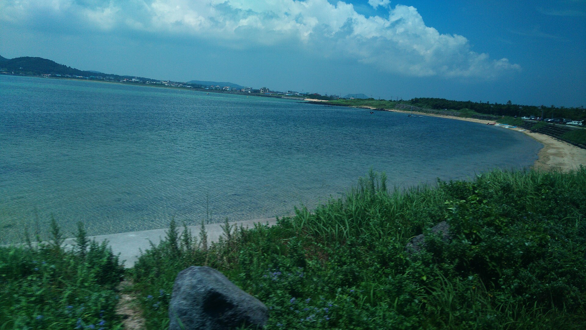 Coastal cliffs and fields at Seopjikoji near Seongsan on Jeju