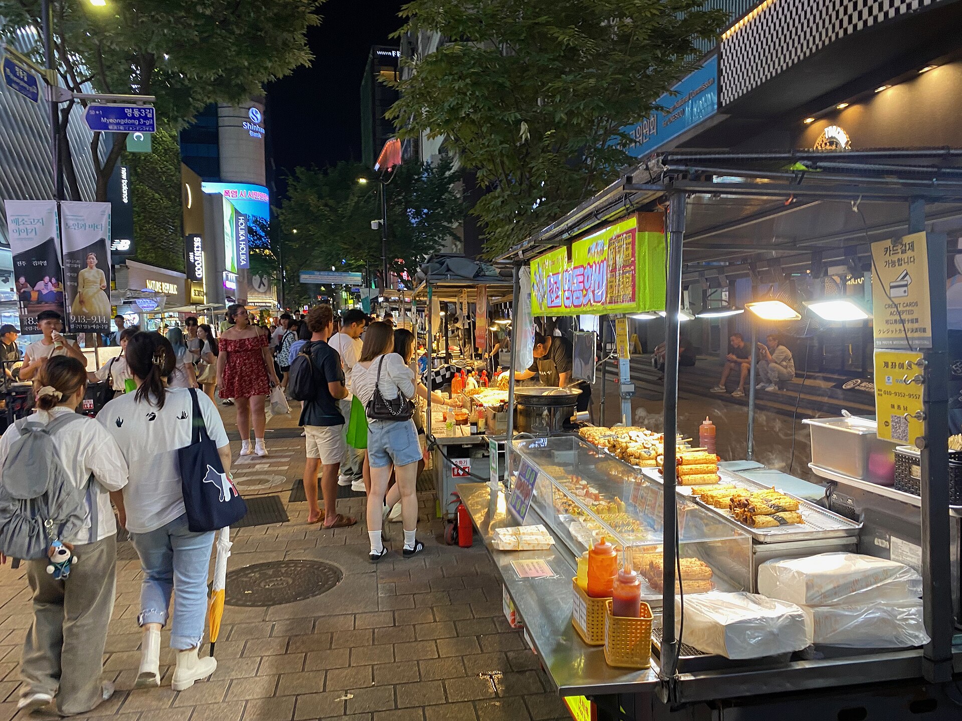 Where to stay in Seoul: Myeongdong at night with street food stalls